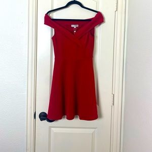 Simple but elegant Red off shoulder short dress.